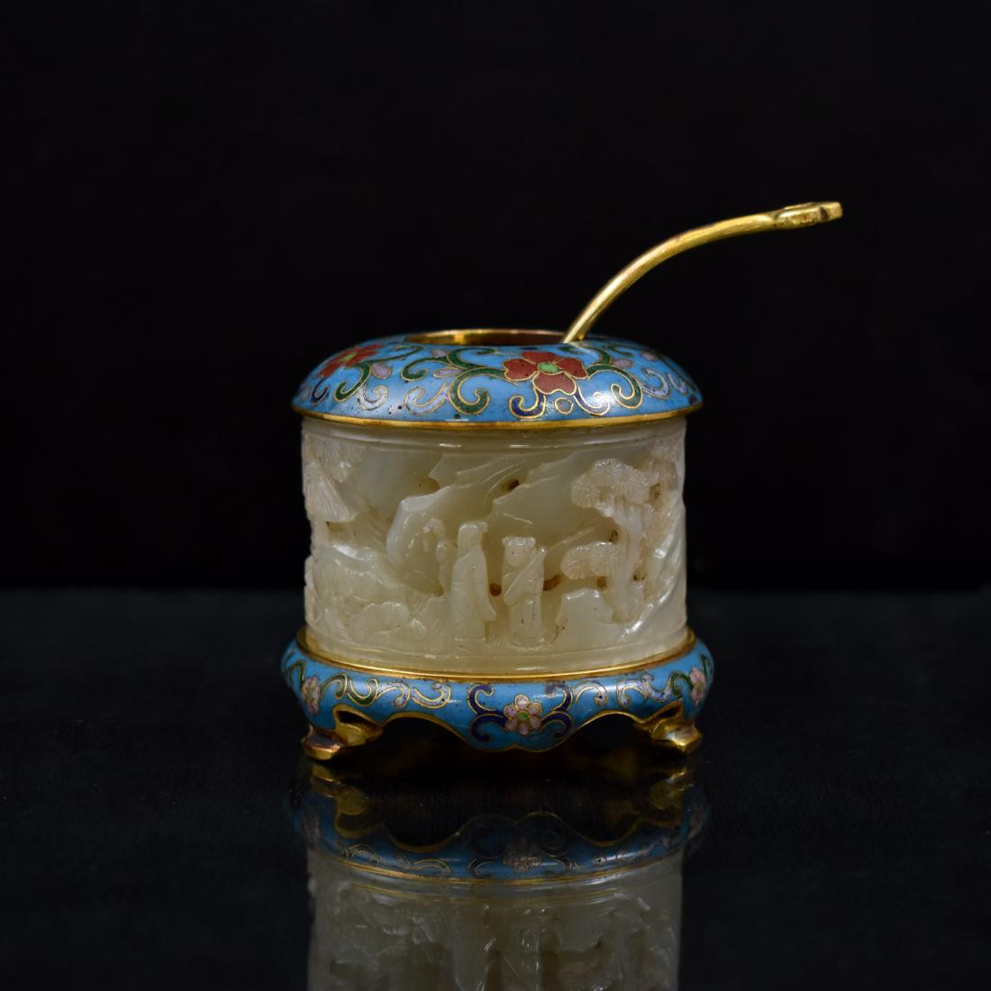 JADE & GILT BRONZE CLOISONNE CENSER: Captivating Cloisonne and jade prayer censer for burning incense. The jade has been carved with intricate patterns. An intertwined floral pattern wraps around the cloisonne cap and base. The Cloisonne