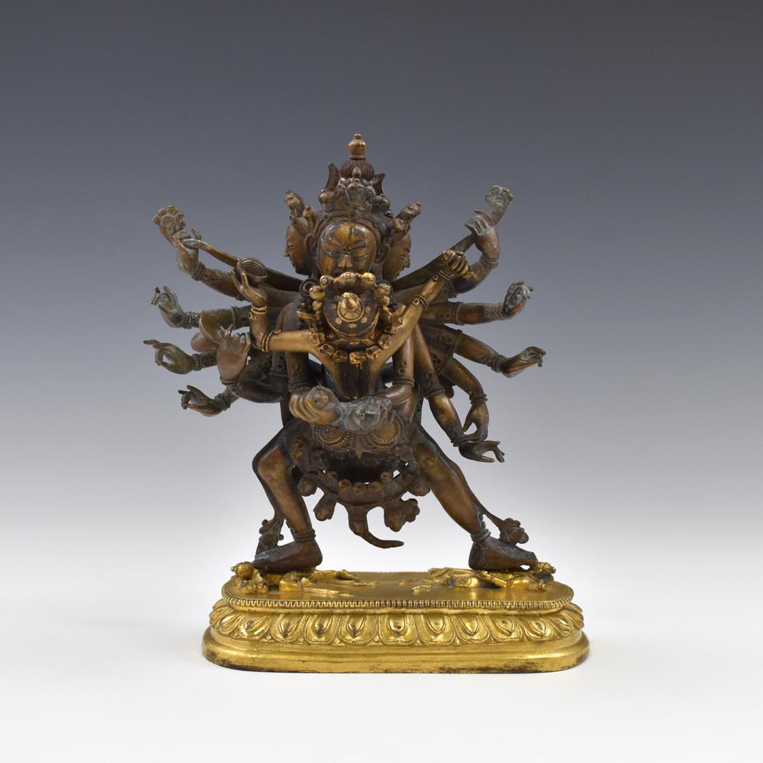 18TH C QING GILT BRONZE BUDDHA CHAKRASAMVARA: 18th C. Chinese Tibetan Qing Dynasty gilt bronze Buddha figure of Chakrasamvara: supreme tutelary deity of the Mother (wisdom) class of Anuttarayoga Tantra of the Sarma Schools. Semi-peaceful and semi