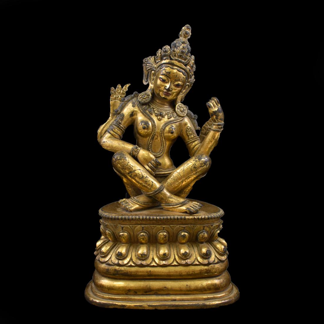 MING GILT BRONZE BUDDHA FIGURE OF SARASVATI: A Chinese Tibetan Ming Dynasty Gilt Bronze Bodhisattva Buddha Figure of Sarasvati, Sita Vina, goddess of literature, poetry and wisdom. The goddess Sarasvati, with one face, two hands. Seated in a rel