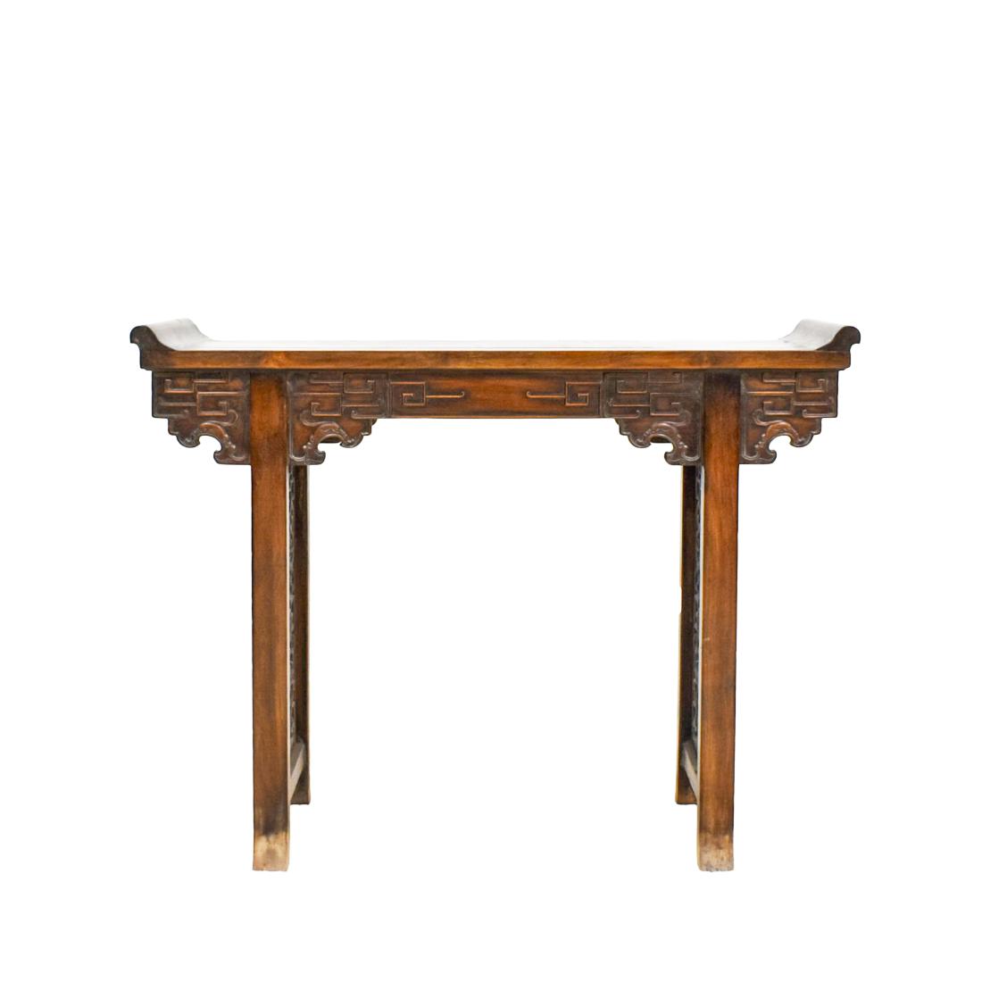 ANTIQUE CHINESE HUANGHUALI ALTAR TABLE: Antique Chinese HuangHuaLi Altar Table. The rectangular top with everted ends surmounting a plain apron flanked by scalloped spandrels forming Ruyi Pattern over the legs, bridged by double stretched b