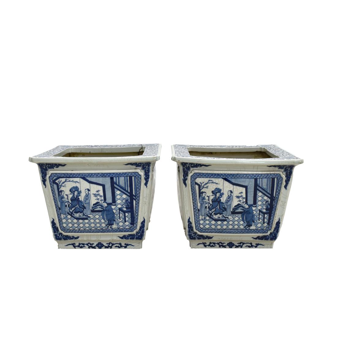 PAIR OF MING BLUE & WHITE PORCELAIN PLANT POTS: Chinese Ming Dynasty porcelain square plant pot. Sturdily potted in a squared body, steep sides supported the flared rim further to the wide opening, raised on splayed foot base. The body decorated in