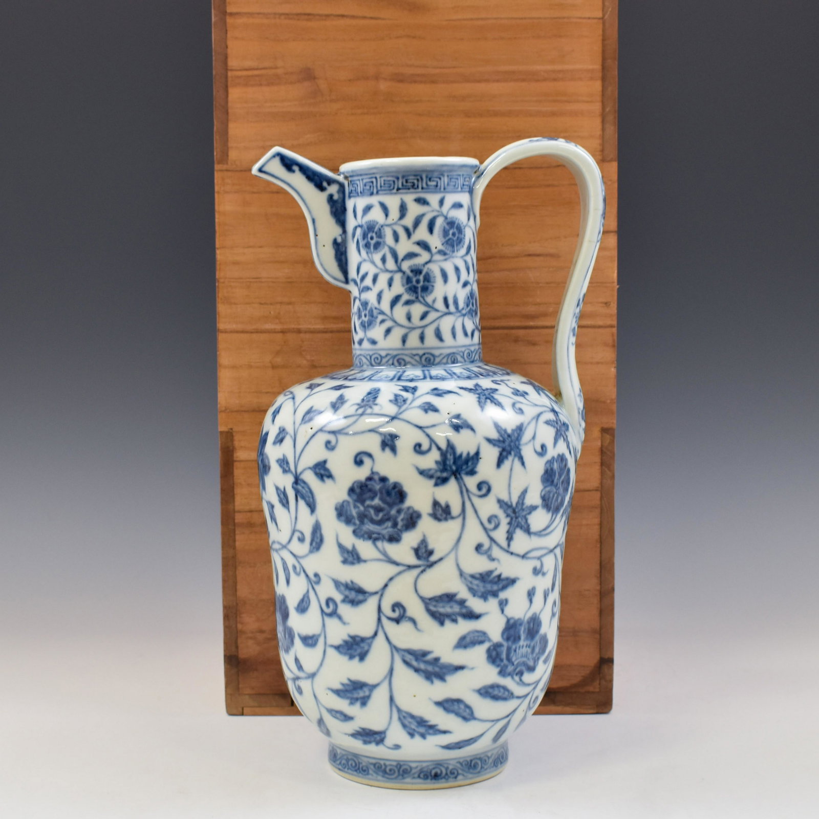 YONGLE BLUE & WHITE WRAPPED FLORAL WINE POT IN BOX: Majestic, Chinese Ming Dynasty Period, Yongle blue & white wrapped floral wine pot in wooden box. The Porcelain potted in wine pot shape, thick, large and tall, baluster body, slight heavy on shoulder