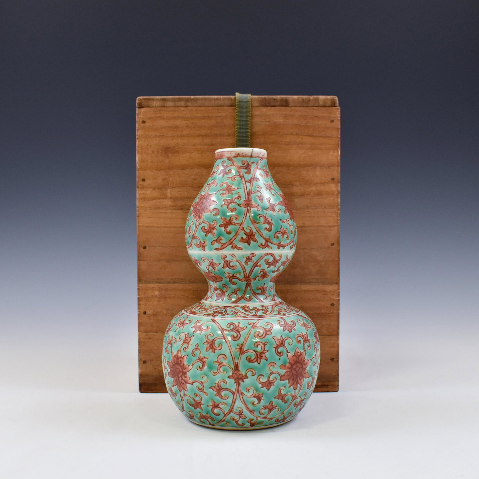 MING JIAJING DOUBLE GOURD VASE: Chinese Ming Dynasty Period, Jiajing porcelain porcelain double gourd vase. The Chinese porcelain potted in a shape of double gourd resemblance, with two bulbous bellies conjoined together, bulbous lo