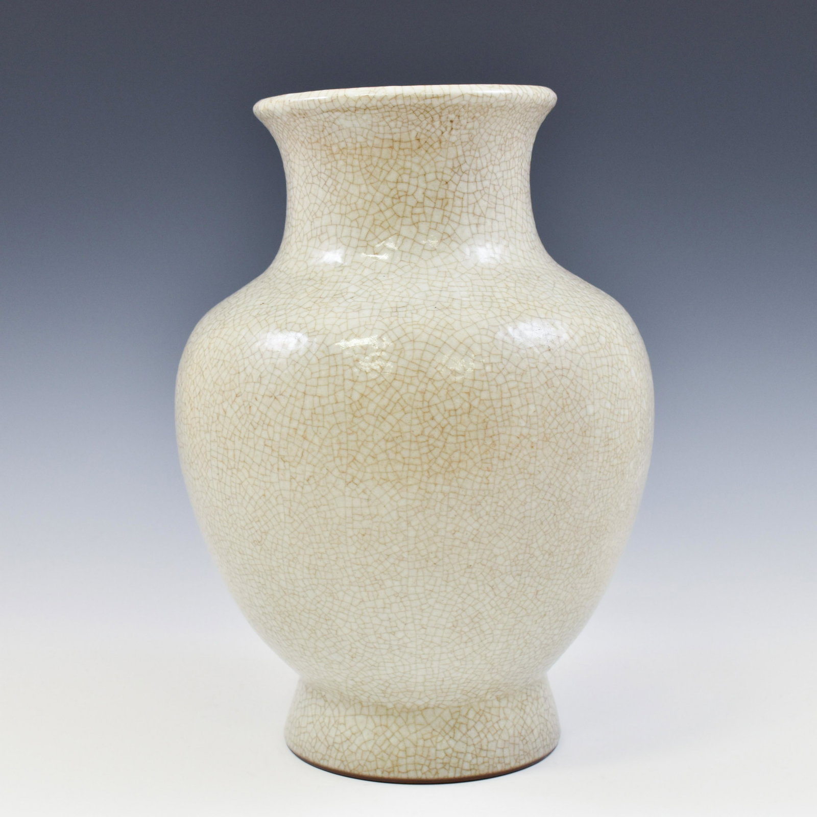 QIANLONG GE WARE ZUN VASE: Chinese Qing Dynasty Period, Qianlong GE ware porcelain Zun vase. The Porcelain potted in a Zun shaped vase, thick, globular body, slighty heavy on mid body, rounded shoulder concealing gracefully to 