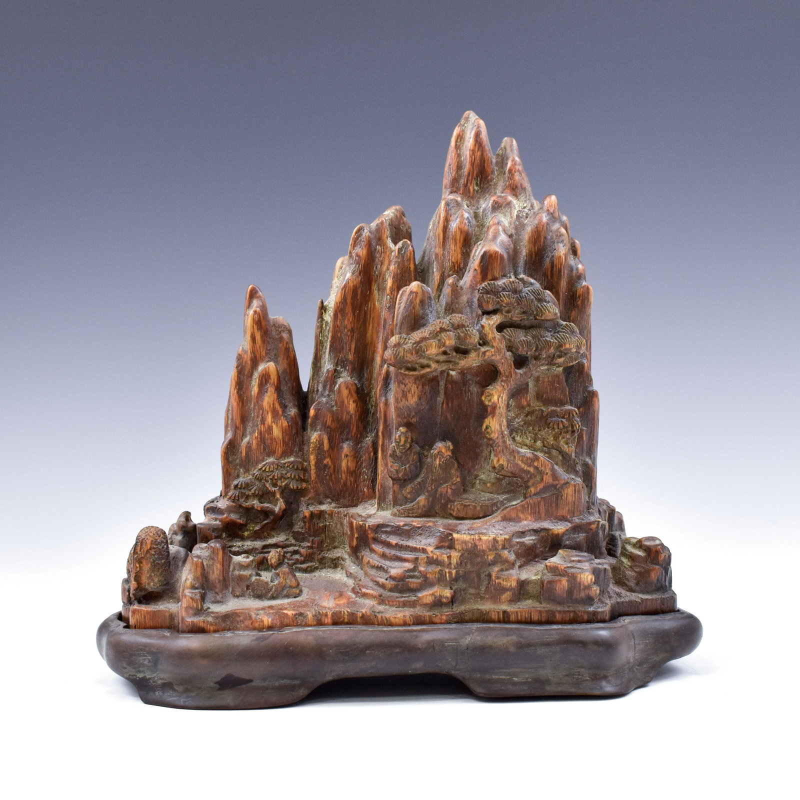 CARVED CHENXIANG MOUNTAIN ON STAND: Lustrous, Chinese Qing Dynasty Period, Chenxiang mountain landscape. The fine ChenXiang wood carved describe of two elder sage relax in seating position below the dense big tree among rocky hill, flow