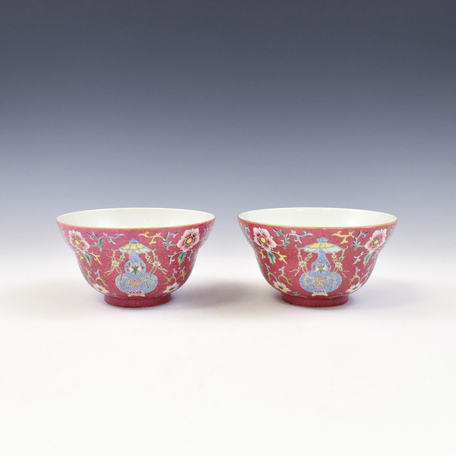 PR. DAOGUANG FAMILLE ROSE BAJIXIANG RUBY RED BOWLS: Pair of Chinese Qing Dynasty Period, Daoguang famille rose bajixiang ruby red porcelain bowls. The porcelain potted with a shallow body, slight deep, broad cavetto, with a straight opening lip, raised
