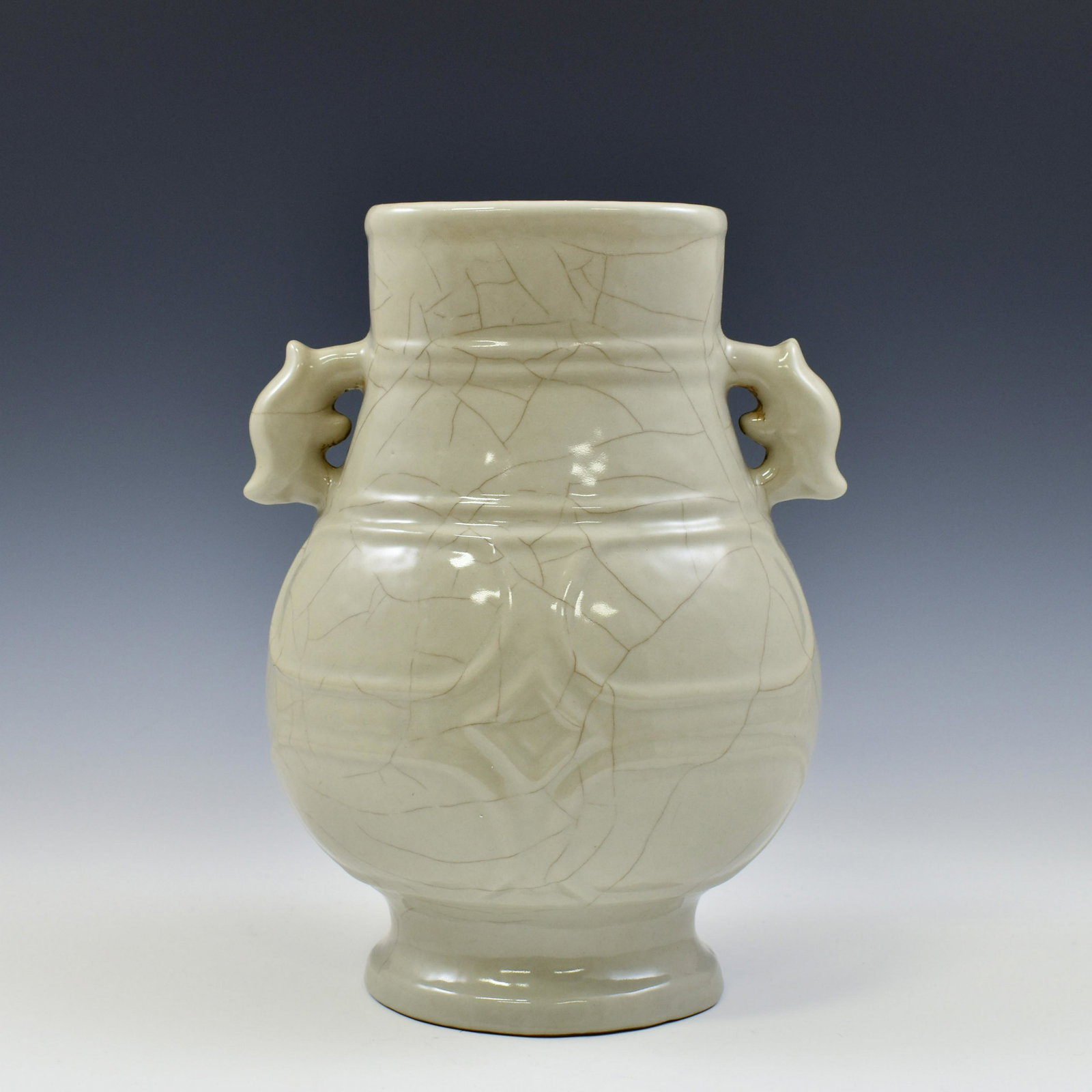 QIANLONG GUAN WARE AMPHORA ZUN VASE: Chinese Qing Dynasty Period, Qianlong GUAN ware porcelain amphora zun vase. The Porcelain potted in a Zun Amphora shaped vase, thick, globular body, slightly oval lower body, rounded shoulder conceali