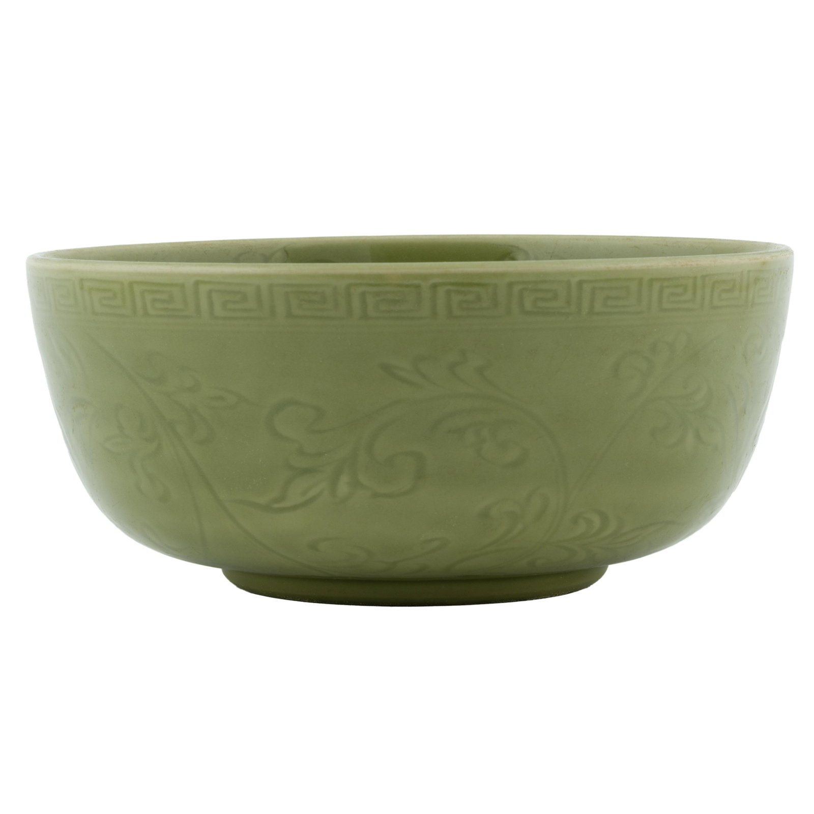 MING LONGQUAN CELADON PORCELAIN BOWL: Large Chinese Ming Dynasty rounded curved bowl leading into a straight rim. Fret designs encircle under the rim with leaves spread across the exterior. Covered over all in olive-green underglaze. Qian
