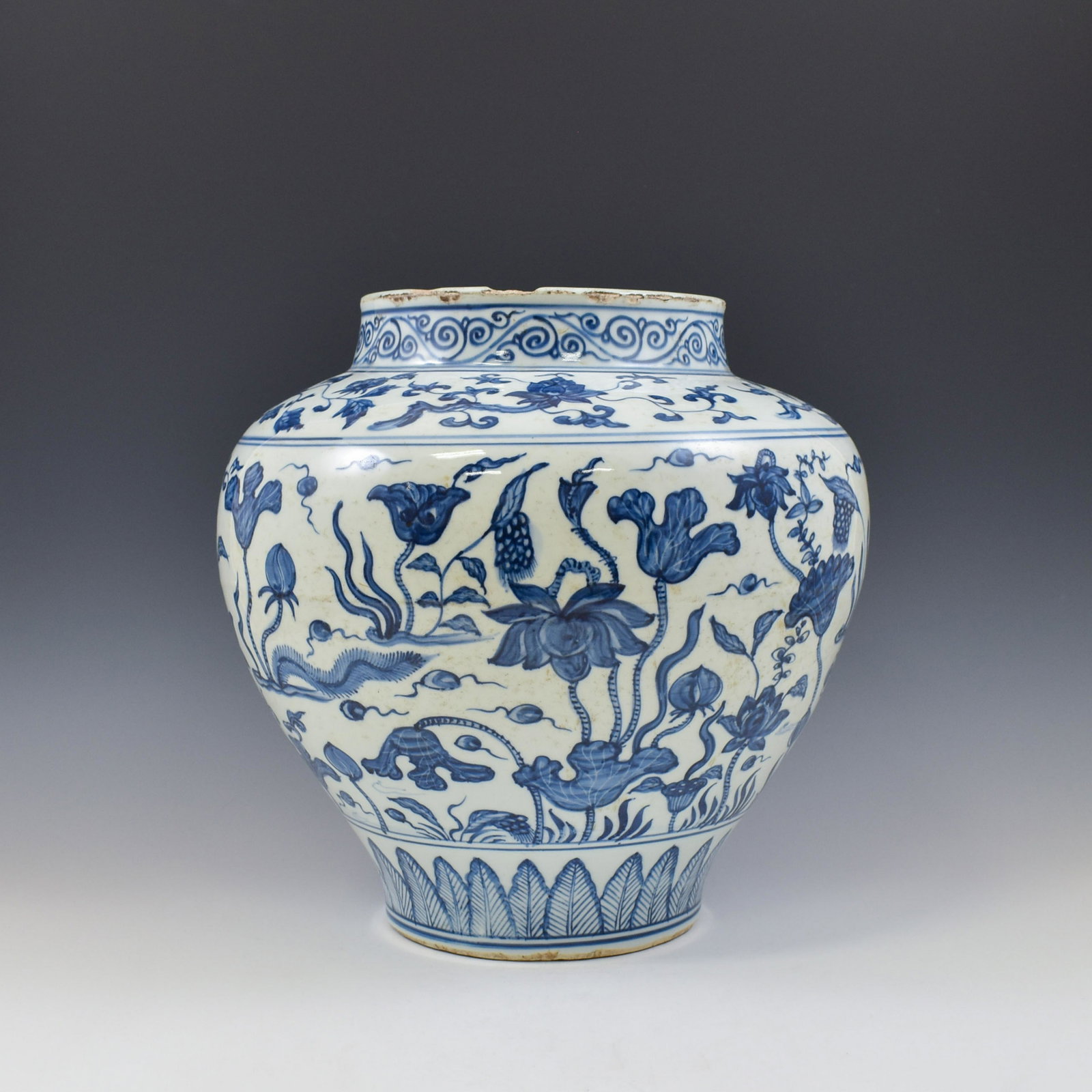 MING BLUE & WHITE LOTUS POND JAR: Chinese Ming Dynasty Period, blue & white lotus pond motif porcelain jar. The porcelain potted in jar shape, having large and thick potted body, sturdily potted in a bulbous body, ovoid belly on middl