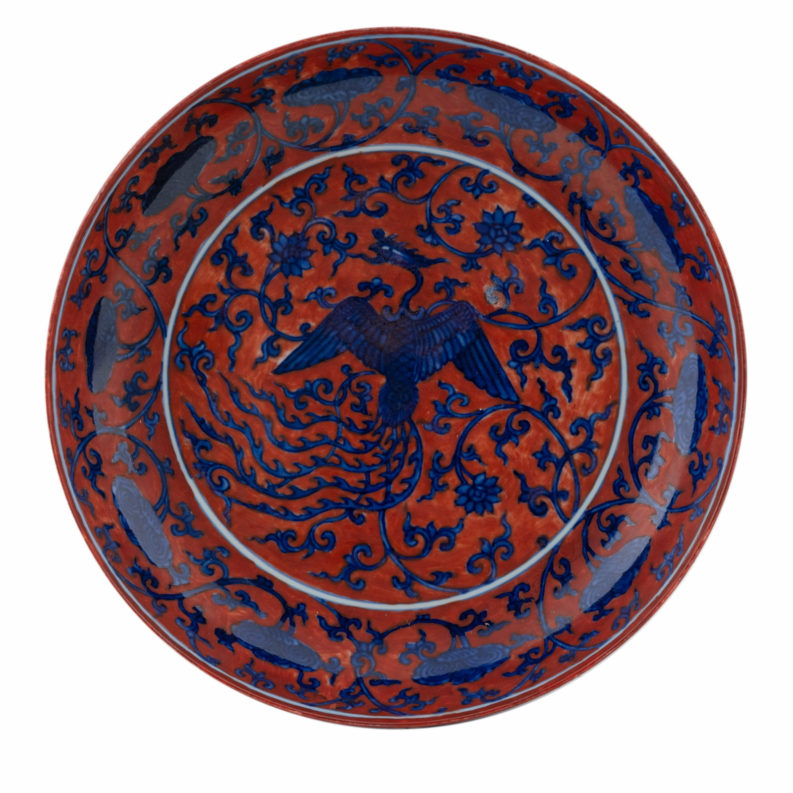 JIAJING BLUE & RED PHOENIX PLATE: Dimensions: Height: 2 1/8" Diameter: 10 1/8" Chinese Ming Dynasty Jiajing blue and red shallow porcelain plate with rounded sides and a slightly everted lip. Exterior painted with beautiful dark blue 