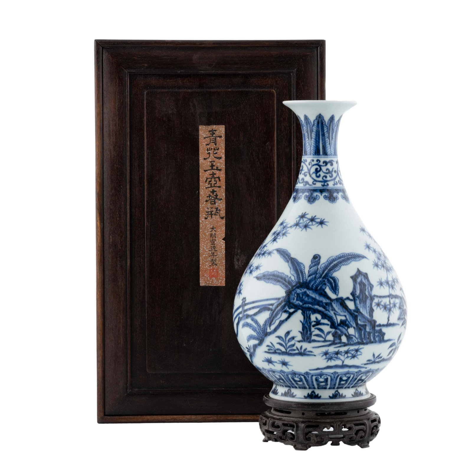 MING BLUE & WHITE PEAR VASE IN WOODEN BOX: Dimensions: Height:12 7/8" Diameter:7 1/4" Stand Height:2" Diameter:5 1/8" Box Height:17 3/4" Width:10 5/8" Depth:10 3/4" Chinese Ming Dynasty blue and white YuHuChun vase in protective hardwood. Fine