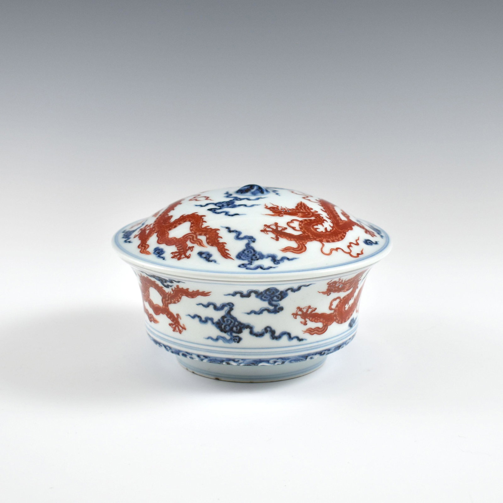 Ming Red & Blue dragon porcelain lidded bowl: Dimensions: 4-1/8" H x 7-1/8" Dia. Chinese Ming Dynasty Period, Red & Blue dragon porcelain lidded bowl. Potted with a shallow body, slight deep, thick and bulbous body, with angled cavetto elevated t