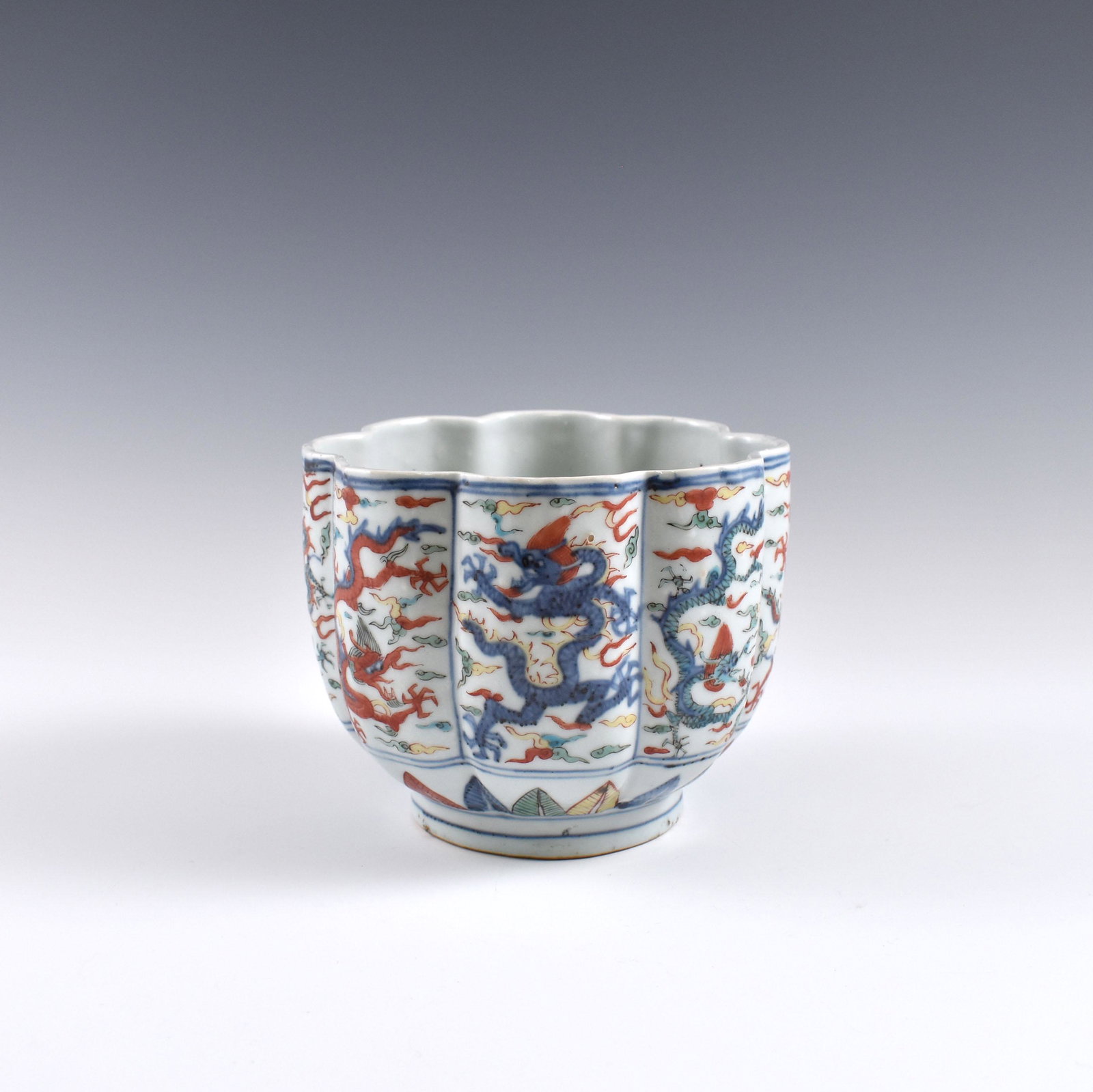 Ming Wucai dragon Flori-Form bowl: Dimensions: 5-1/4" H x 6-1/2" W Chinese Ming Dynasty Period, Wucai dragon Flori-Form bowl. Potted in brush holder shape, sturdily in cylindrical straight body, thick potted, deep curvature, slight tal