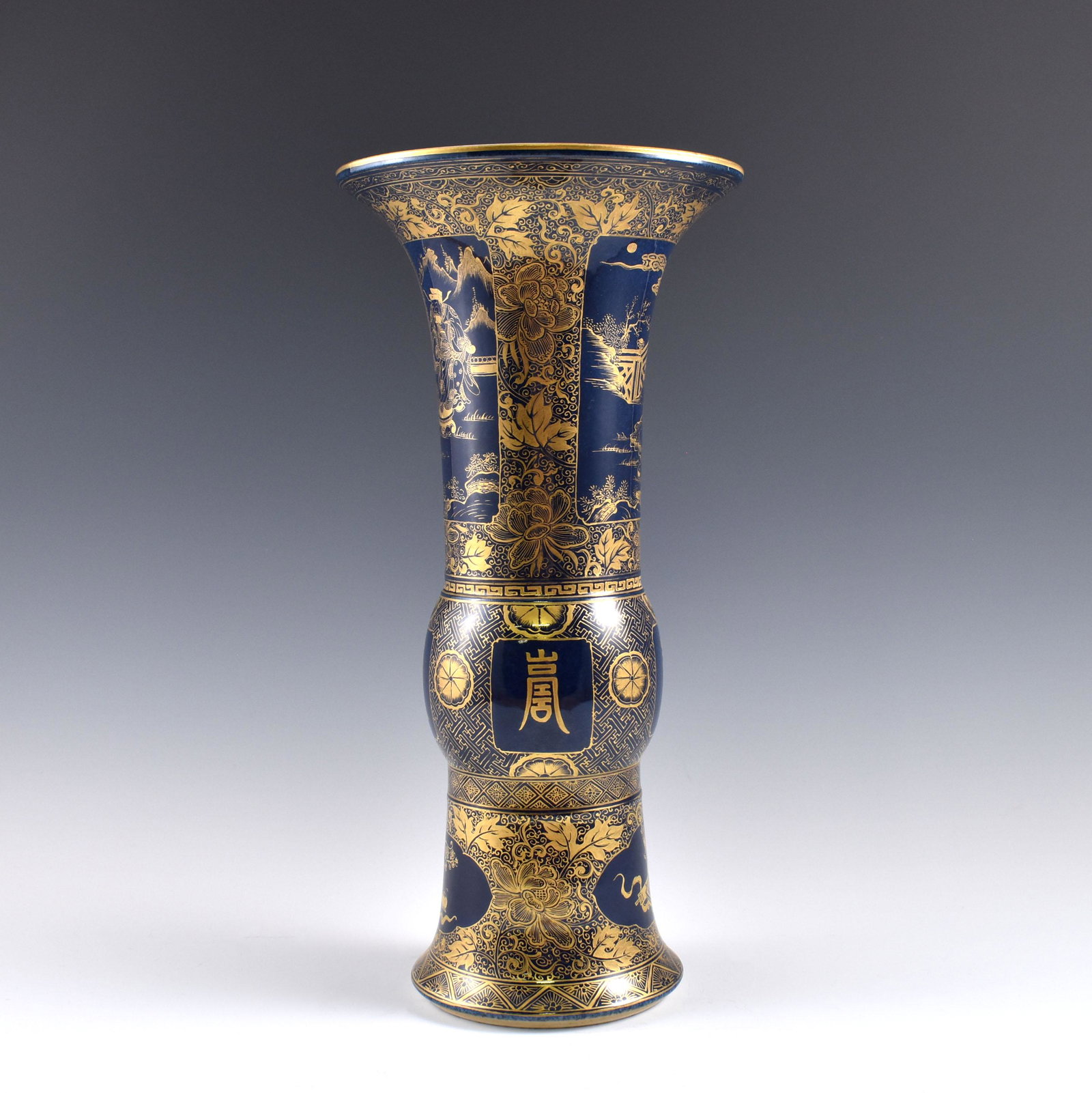 Kangxi gilt over cobalt blue gu vase: Dimensions: 16-1/4" H x 7-7/8" Dia. PROVENANCE: From Private estate collections of Jullias Phillips (1923 - 2017), Marietta, Georgia. When WWII started, Jullias worked at the Charleston Navy Yard help