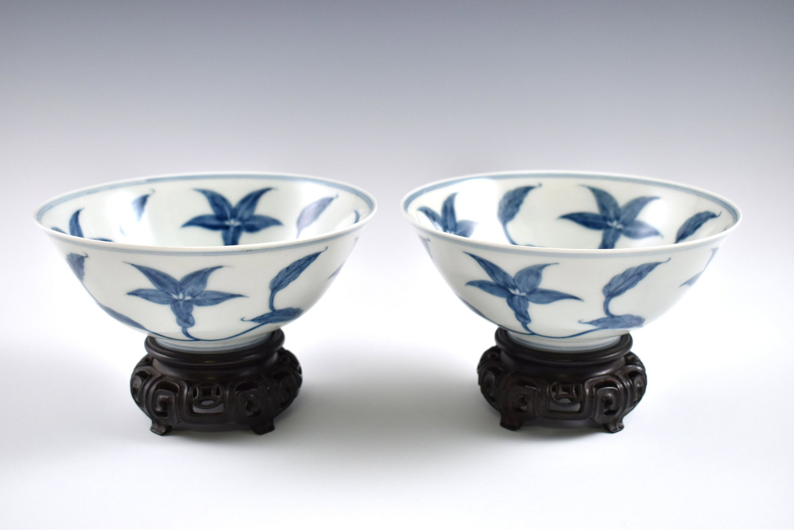 PR. Ming Chenghua Blue & white foliate on stands: Dimensions: 2-1/2" H x 6-1/4" Dia. Stand: 1-1/2" H Pair of Chinese Ming Dynasty Period, Blue & white foliate on stands. Potted with a shallow body, slight deep, thick and bulbous body, with angled cav