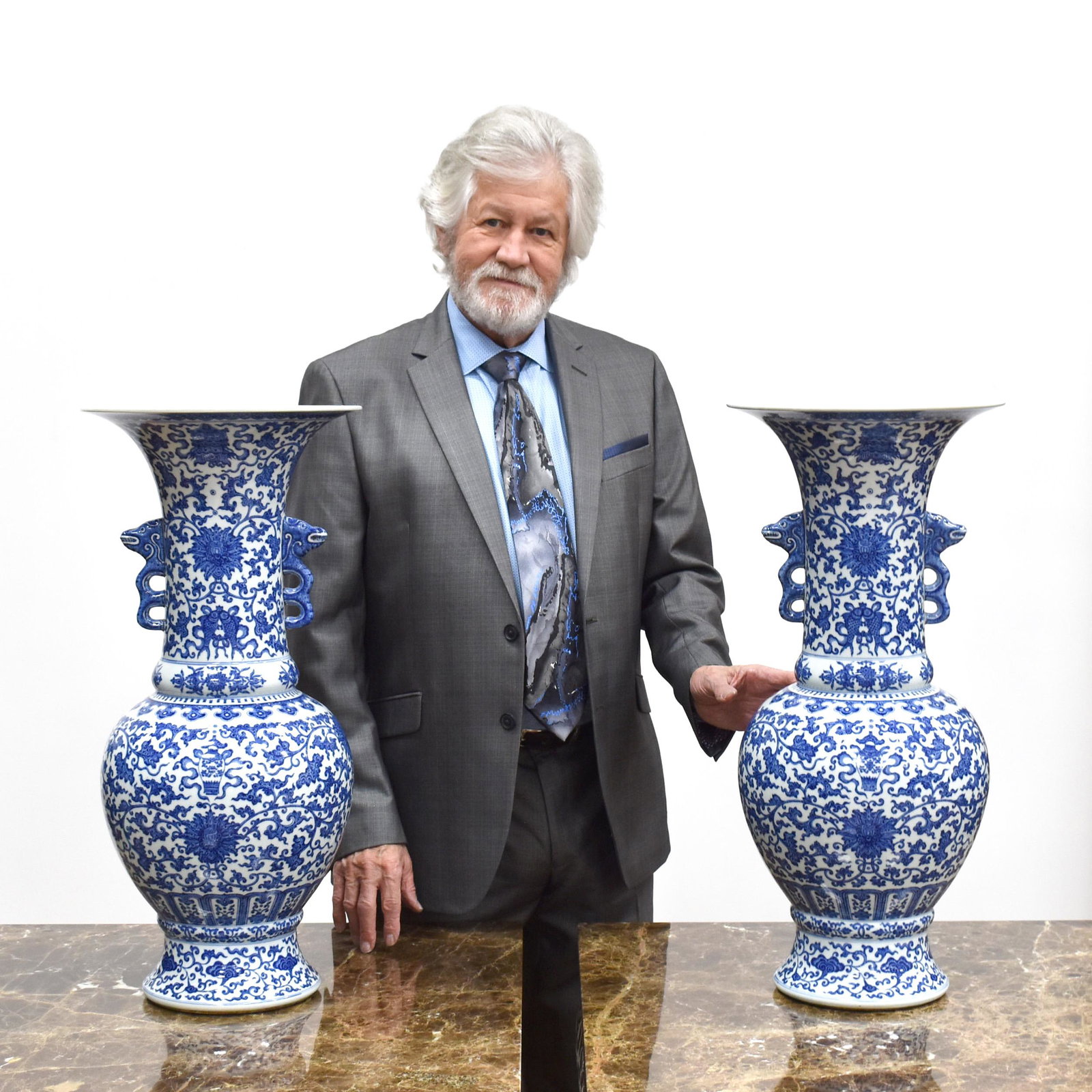 PAIR BLUE & WHITE AMPHORA FLOWER VASES: PROVENANCE: From the Collections of Franklin Wood (1924-2019) Cartersville, GA. Franklin was born in a small farmhouse near White GA in 1924. After spending his early childhood on the family farm the 
