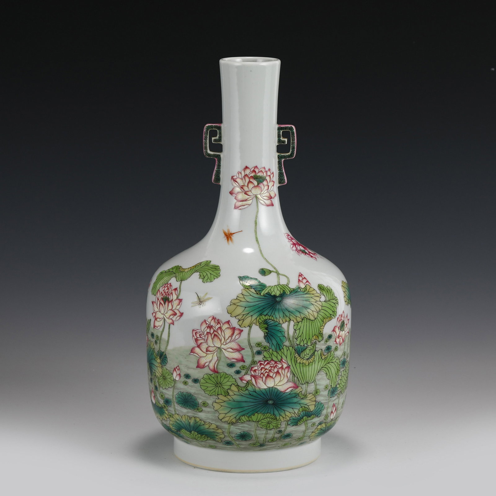 FAMILLE ROSE LOTUS MOTIF AMPHORA VASE: Dimensions (cm): Height: 35 Diameter: 19 Chinese Qing Dynasty Period Famille Rose Lotus pond motif Porcelain amphora Vase. The porcelain potted in bell shape vase, globular lower body, tapered gracefu
