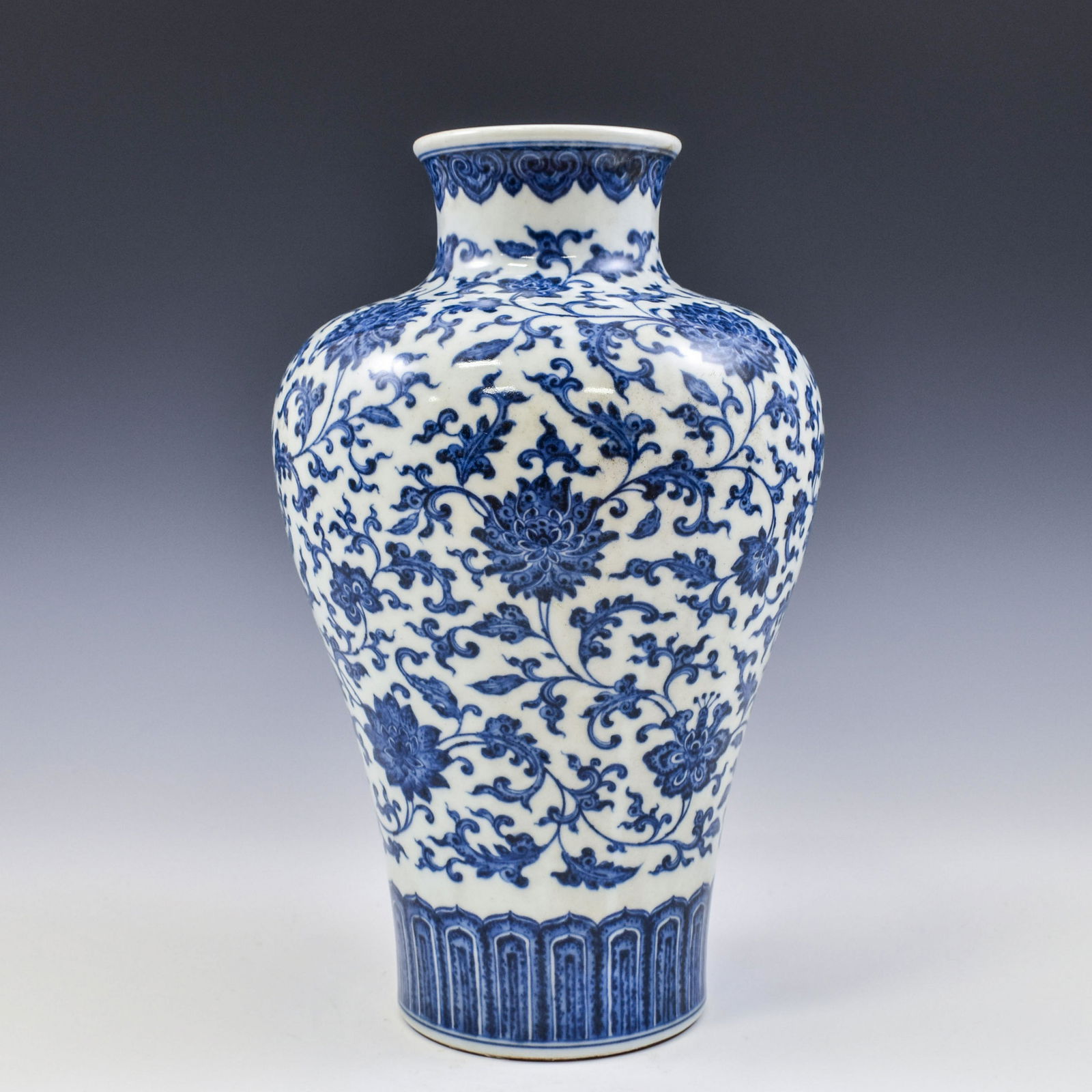 QIANLONG BLUE & WHITE WRAPPED FLORAL MEIPING JAR: PROVENANCE: Private (Estate) collections of Jack J. Woo, by inheritance. Dimensions: 7.5"L x 12.5"H Chinese Qing Dynasty Period, Qianlong blue & white wrapped floral motif porcelain meiping jar. The