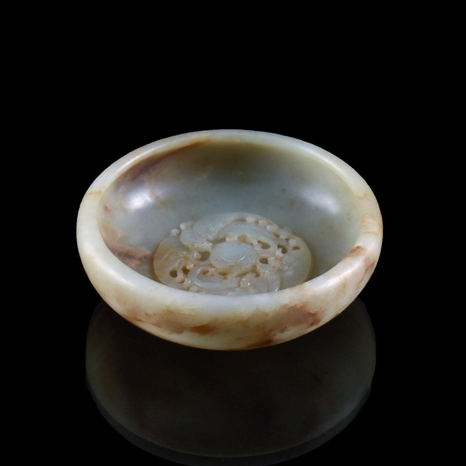 CHINESE JADE CARP RELIEFS BRUSH WASHER: Dimensions: 1-1/2" H x 4-1/8" Dia. Antique Chinese jade carved brush washer. Compressed rounded form with a hollowed curvature. Exterior is finely polished with the interior in reliefs of four carps w