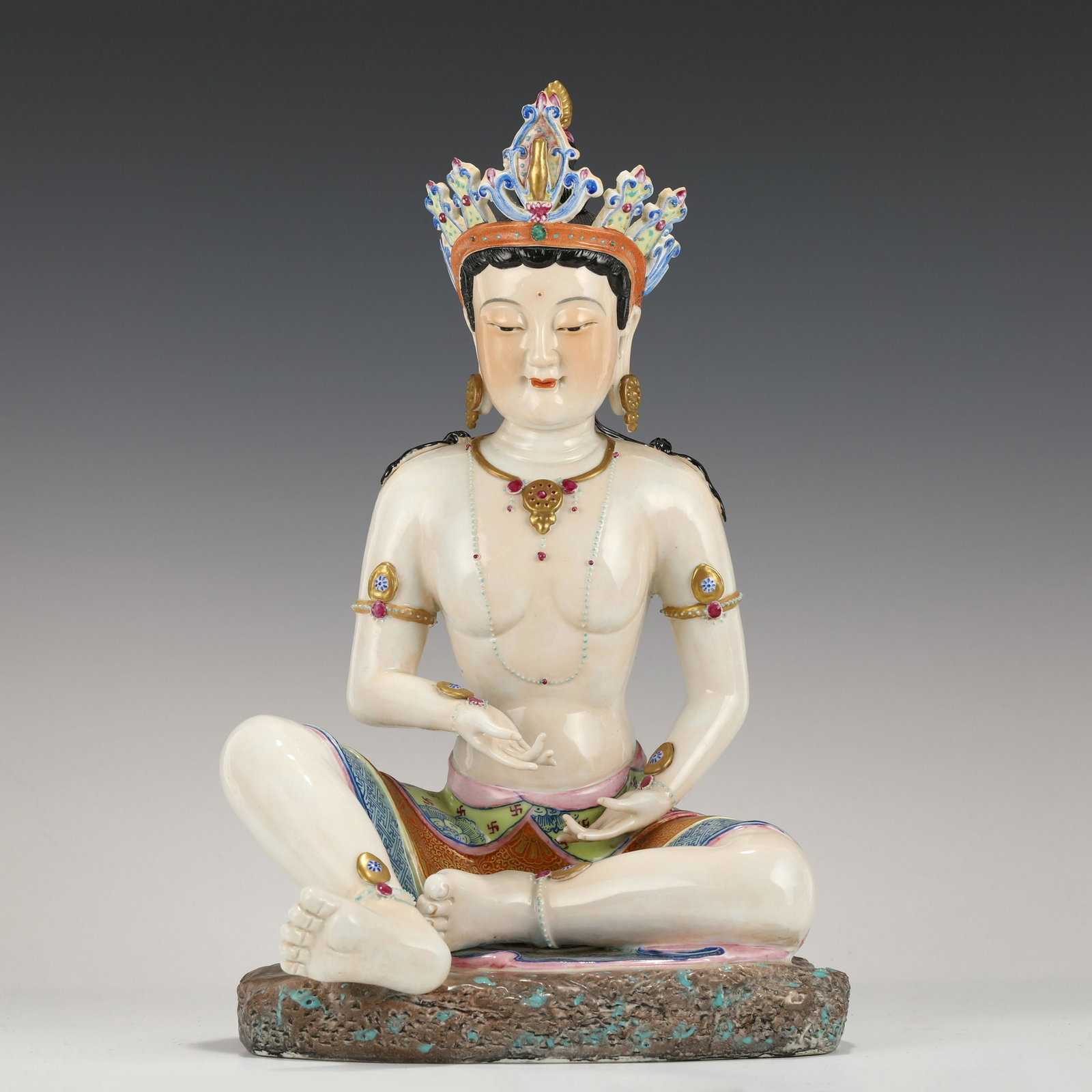 QIANLONG FAMILLE ROSE GUANYIN: Dimensions: Length: 23 cm, Width: 21.5 Height: 40 cm Chinese Qing Dynasty Famille Rose Porcelain Buddha. This Porcelain statue of Buddha Guanyin is perfect in shape, fine workmanship, complex and meti