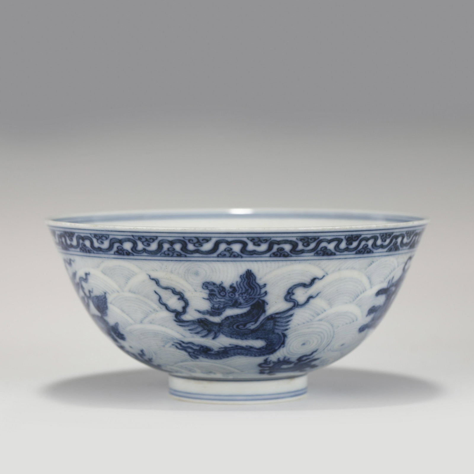 MING CHENGHUA BLUE & WHITE BOWL: Dimensions: Width: 15.5cm, Height: 7cm Chinese Ming Dynasty Chenghua Blue and White Dragon Porcelain Bowl. The porcelain potted with a shallow body, slight deep, thick, flaring rim with angled cavetto