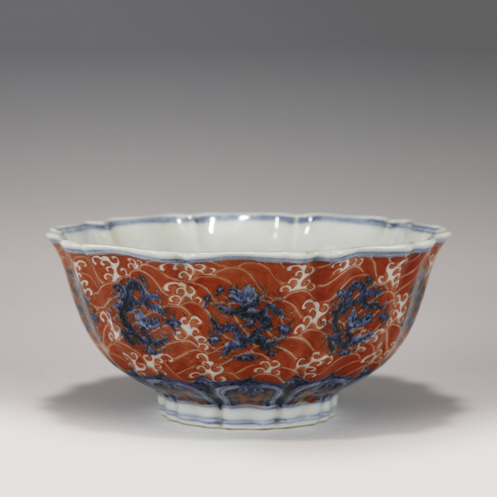 MING XUANDE BLUE & WHITE ALUM RED BOWL: Dimensions: Width: 19cm, Height: 8.5cm Chinese Ming Dynasty Xuande Blue and White Alum Red Dragon Porcelain Bowl. The porcelain potted with a shallow body, slight deep, thick, flaring rim with angled 