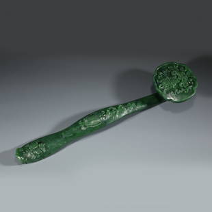 GREEN JADE FUSHOU RUYI: Dimensions: Length: 40.5cm, Width: 9.5cm, Height: 5cm Chinese Green Jade Fushou Ruyi Scepter. The flori-form ruyi shaped petals of the head carved with imperial five claws dragon flying careening