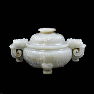 JADE LIDDED CENSER: Dimensions: 103.03mm H x 190.5mm W Weight: 852.6g Very fine Chinese Carved White Jade lidded censer. Raised on splayed foot base, elaborately open work carved Dragon curved handles extending