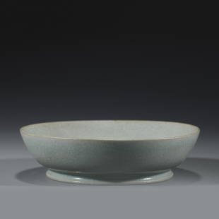 SONG RU WARE PLATE: Dimensions: Width: 14.3cm, Height: 3.8cm Chinese Song Dynasty Rukiln Porcelain Small Plate. The plate has a broad central interior, rounded mouth lip, thick, raised on correspondence footed ring