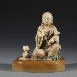 SHOUSHAN STONE CARVED ARHAT ON STAND: Dimensions: Length: 11.2cm, Width: 5cm, Height: 13 cm, Weight: 571g Chinese Qing Dynasty Shoushan Stone Arhat Buddha On Fitted Stone Stand. This Porcelain statue of Buddha is perfect in shape, fine