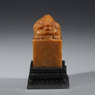 TIANHUANG STONE CHOP SEAL: Dimensions: Length: 3.5cm, Width: 3.5cm, Height: 6.5 cm, Weight 173g Chinese Qing Dynasty Tian Huang Stone Seal On Carved Harwood Stand. A cube shaped of jade carved to a smooth surface with a