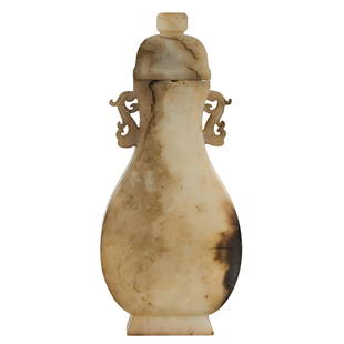 QING JADE BALUSTER COVERED VASE & DRAGON HANDLES: Dimensions: Height 9-7/8" Width: 4-3/8" Weight1297g A Chinese mutton-fat jade baluster shaped vase with Gray and brown inclusions . The domed cover is topped by a square bud. The shoulders