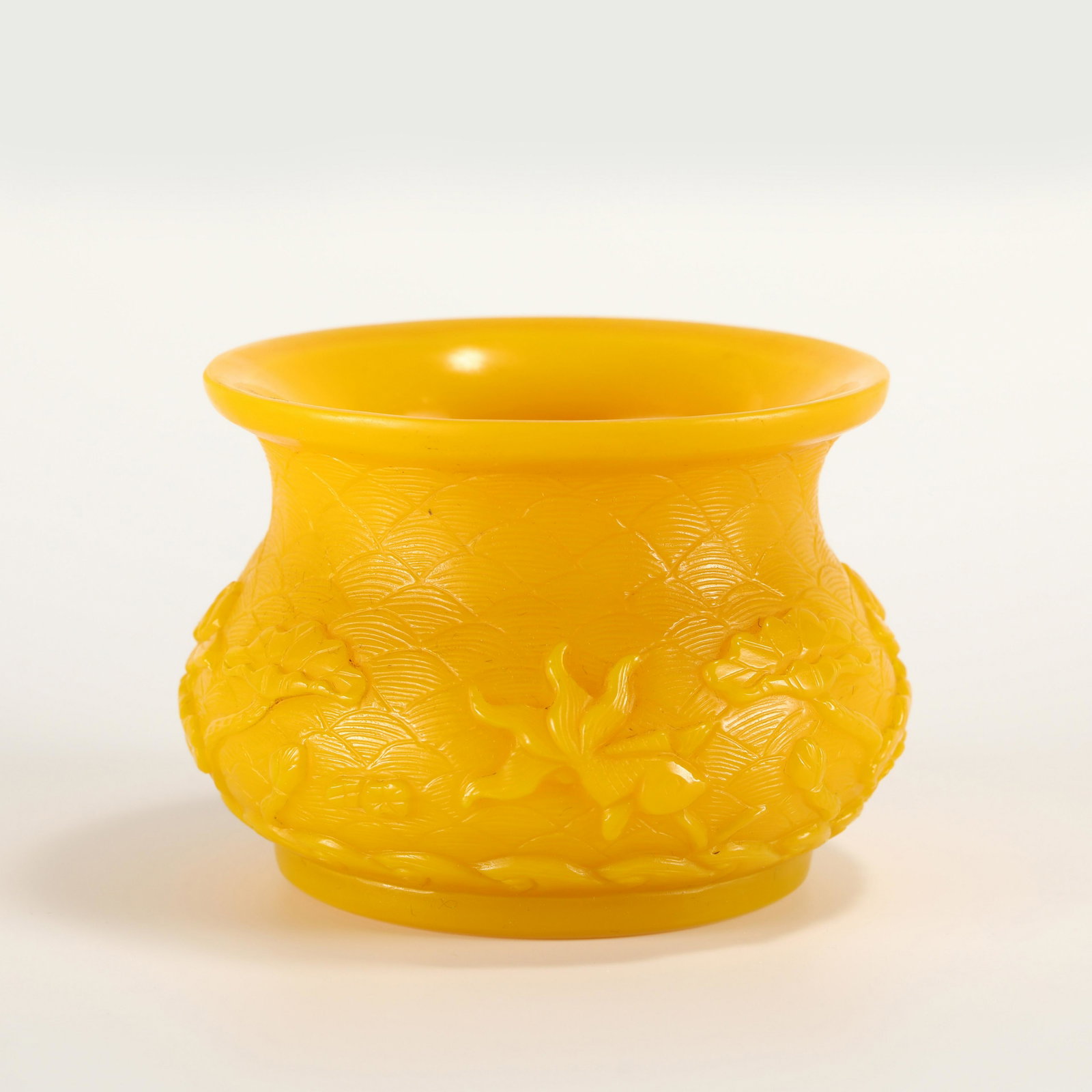 QING QIANLONG GLASS PIERCING BUCKET: Dimensions: Heigth: 7.9 cm, Diameter: 11 cm Chinese Qing Dynasty Qianlong Yellow Glass Piercing Bucket Jar. Stoutly carved Chinese glass unto jar has an wide open mouth with a slightly out-turned lip,