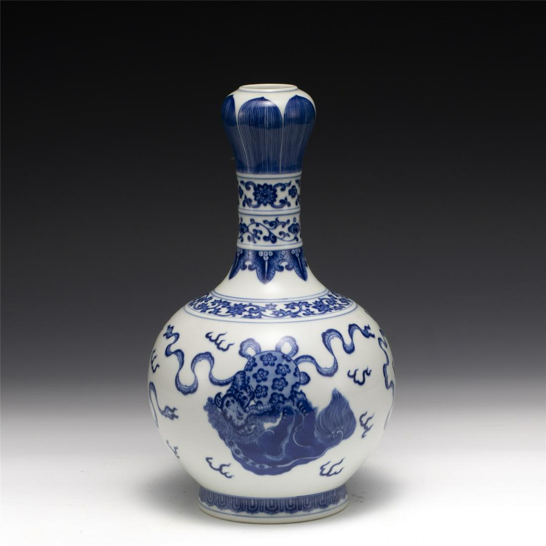 QING QIANLONG BLUE & WHITE GARLIC VASE: Dimensions: Width: 16.4 cm, Height: 27.6 cm Chinese Qing Dynasty Qianlong Blue and White Porcelain Garlic Vase. Potted in garlic bottle vase, bulbous lower belly, thick, with rounded shoulder, long cy