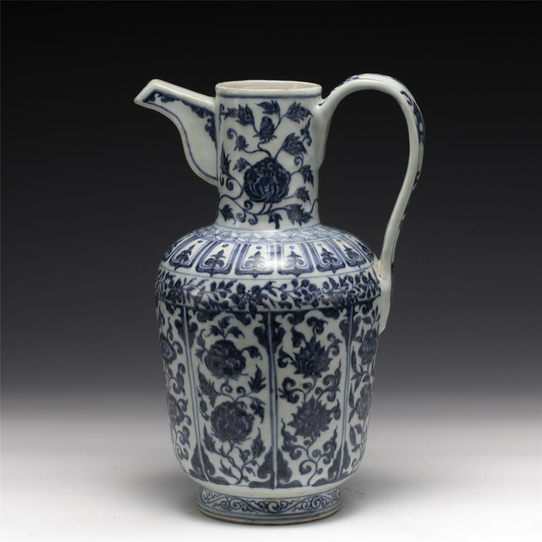 MING BLUE & WHITE POT: Dimensions: Length: 20.5 cm, Width: 16.8 cm, Height: 32.5 cm Chinese Ming Dynasty Blue and White Porcelain Pot. Potted in wine pot shape, globular body,, with curved spout flanked on cylindrical neck 