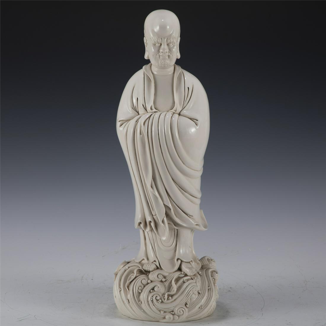 MING DEHUA LUOHAN: Dimensions: Length: 17 cm, Width: 15.8 cm, Height: 47.4 cm Chinese Ming Dynasty Dehua LuoHan. This statue of LuoHan potted in a Peaceful face, smiling, beautiful and youthful, giving peaceful appearan