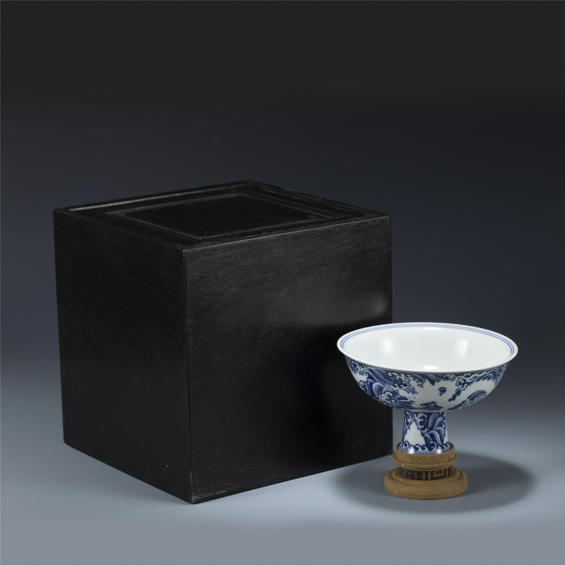 MING XUANDE BLUE AND WHITE HIGH BOWL IN BOX: Dimensions: Length: 15.5 cm, Width: 15.5 cm, Height: 9.7 cm Chinese Ming Dynasty Xuande Blue and White Dragon Porcelain Tall Bowl on Carved Hardwood Stand with Fitted Original Hardwood Box . The Bowl 