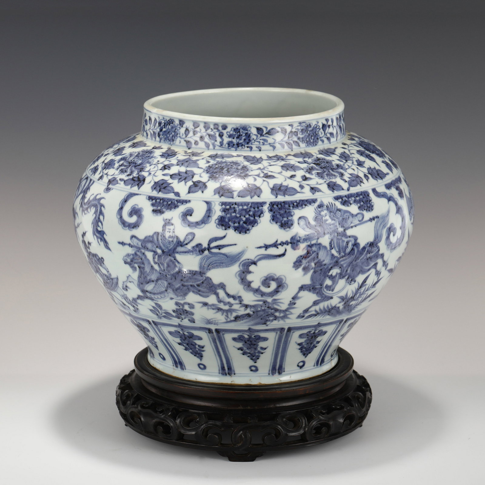 YUAN BLUE & WHITE BATTLE SCENE JAR ON STAND: PROVENANCE: John Gorse (1945-2020) of Charleston, SC. A business entrepreneurs, private collectors. A retired as senior vice president for legal and regulatory affairs in 1981. After retirement he foc