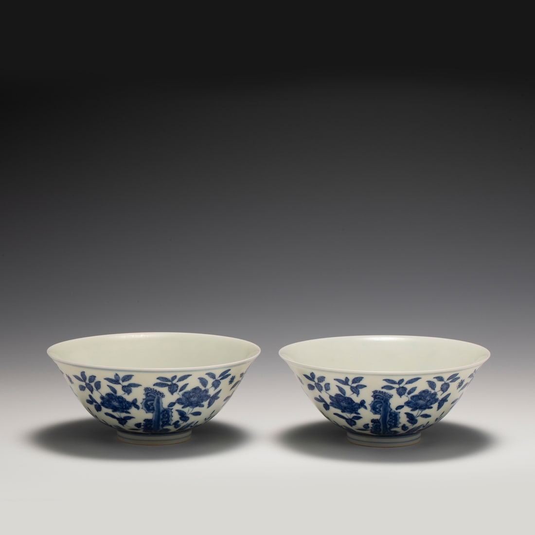 PAIR OF MING CHENGHUA BLUE & WHITE BOWLS: Dimensions: Width: 15.2 cm x Heigth: 6.3 cm Pair of Chinese Ming Dynasty ChengHua Blue and White Flowers Porcelain Bowls. The porcelain potted in a shallow body, slight deep, flaring rim with close mo
