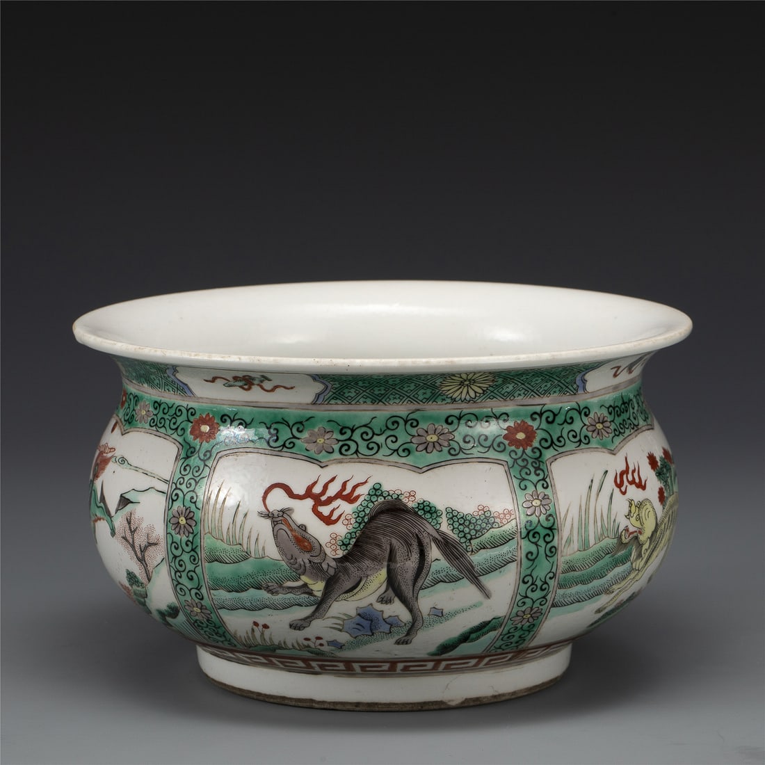 QING KANGXI WUCAI INCENSE BURNER: Measurements: Width: 22.7 cm, Height: 13 cm Chinese Qing Dynasty KangXi Wucai Porcelain Incense Burner. Potted in shallow vessel form, thick and deep, globular body, short neck with flaring mouth rim,