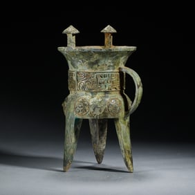 ARCHAIC BRONZE TRIPOD WINE VESSEL