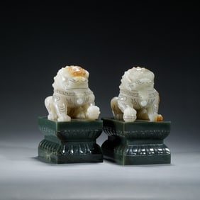 PAIR HETIAN JADE CARVED FU LIONS ON STAND