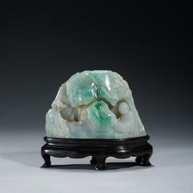JADEITE CARVED GROTO ON STAND