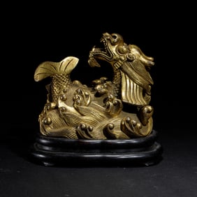 GILT BRONZE SEA DRAGON STATUE ON STAND