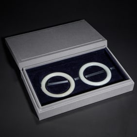 PAIR HETIAN JADE CARVED BANGLES