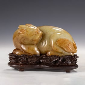YELLOW JADE CARVED QILIN ON STAND