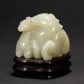 HETIAN JADE CARVED QILIN STATUE ON STAND