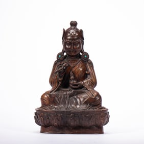 CHENXIANG ALLOESWOOD CARVED SEATED BUDDHA