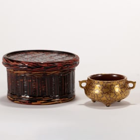 A CHINESE GOLD MOTIF TRIPOD CENSER IN BOX