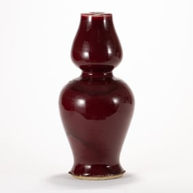 A CHINESE RED MONOCHROME GOURD VASE